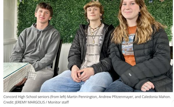 Three Concord High School seniors seated on a bench: Martin Pennington, Andrew Pfitzenmayer, and Caledonia Mahon.
